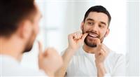 تنظيف الأسنان التركيب الثابتة والعناية بها